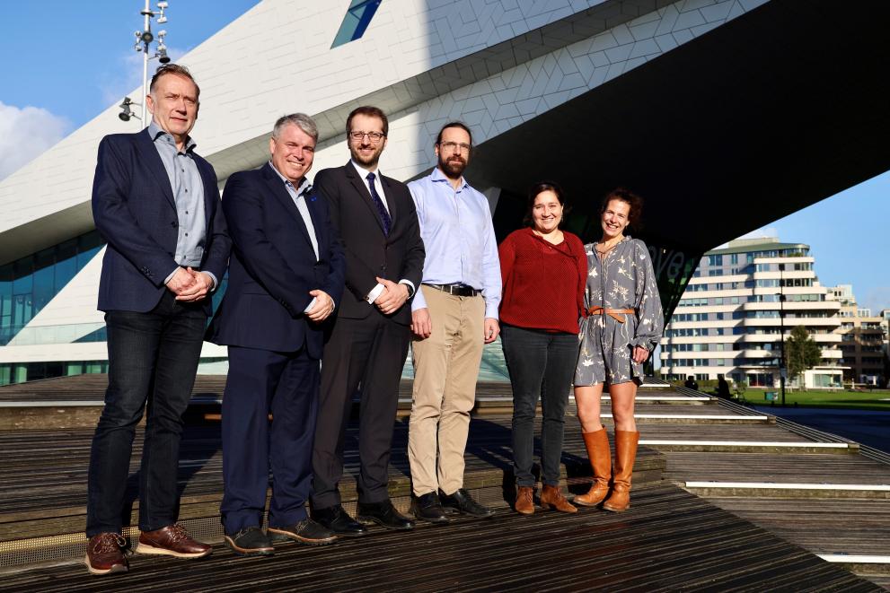 Group picture outside of the EuroHPC User Day 2024 venue with representatives from EuroHPC JU, SURF and Quantum Delta NL